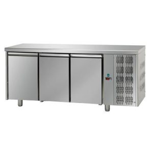 Under-counter fridge unit built into a kitchen